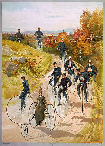 "Bicycling", a ca. 1887 color print showing one of the few ways in which it was socially acceptable for women to ride cycles, in the years before the invention of "safety bicycles" and the woman's "bicycle suit"